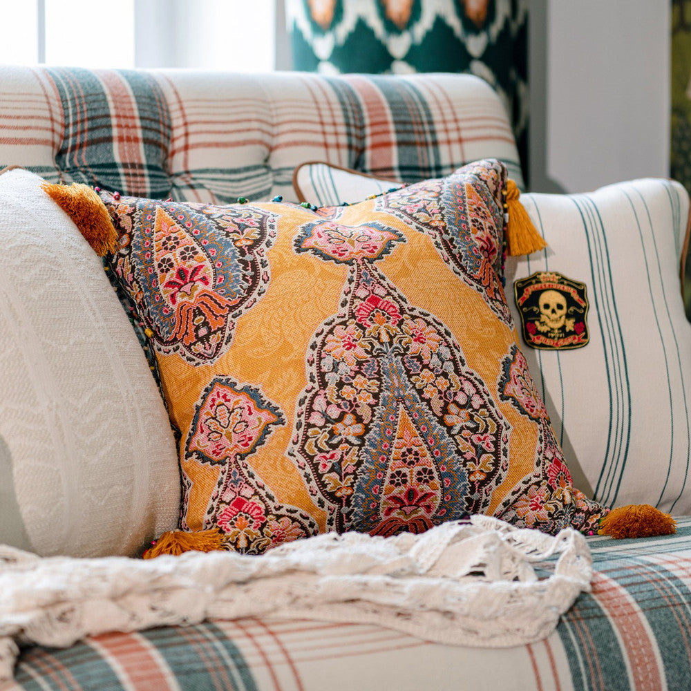 GIPSY SOUL Cushion (LC40146) by Mind The Gap | LC40146 | WOODSTOCK '69 LIFESTYLE COLLECTION | 20 x 20 in | Blue, Ochre, Pink | Fabric Carolina | https://www.fabriccarolina.com/