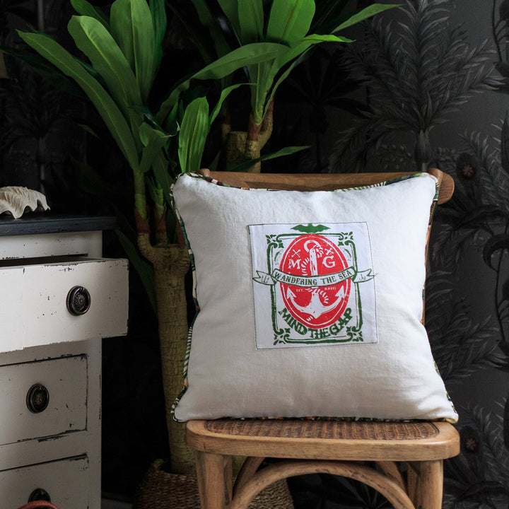 WANDERING THE SEA Cushion (LC40064) by Mind The Gap | LC40064 | THE TROPICAL COTTAGE | 20 x 20 in | Green, Red, White | Fabric Carolina | https://www.fabriccarolina.com/