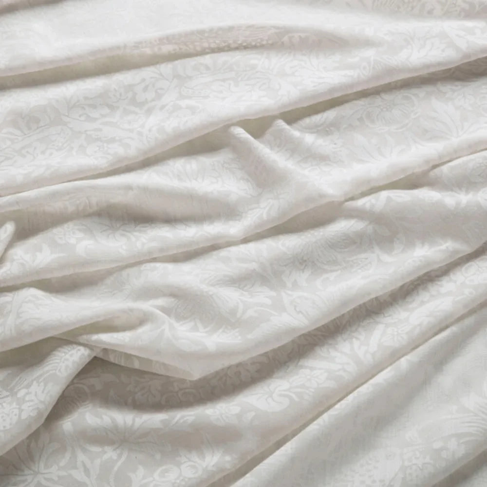 7917 Strawberry Theif Sheer 2 Sand by Wmah Designer Fabric 7917 Strawberry Theif Sheer 2 Sand by Wmah Fabric WILLIAM MORRIS AT HOME DOVECOTE VOL 1 63%POL 34%SVI 3%LIN Turkey Horizontal: 19.625 and Vertical: 22.5 118 in - Fabric Carolina -