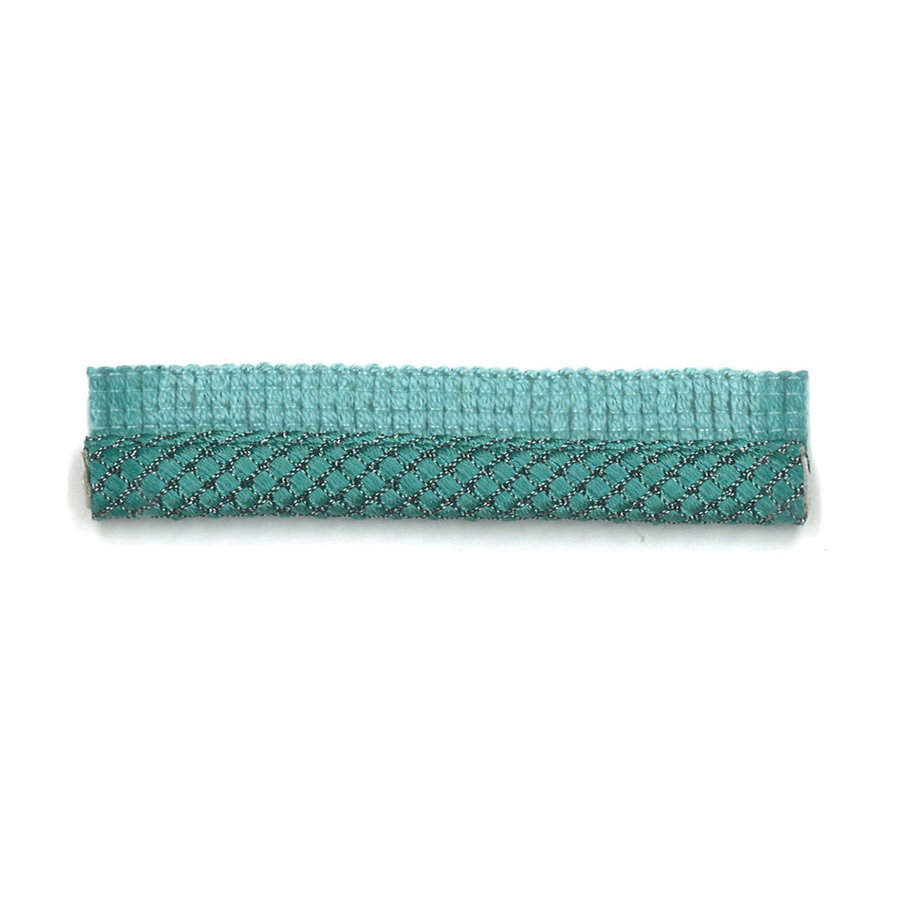 Dimaggio 5 Turquoise by Stout Trim Stout Trim Dimaggio 5 TurquoiseTrim NEW WORLD TRIM VOLUME II 69%SVI 30%COT 1%POL GERMANY </p><p>Repeat: H: 0.000, V: 0.000 0.38 in - Fabric Carolina -
