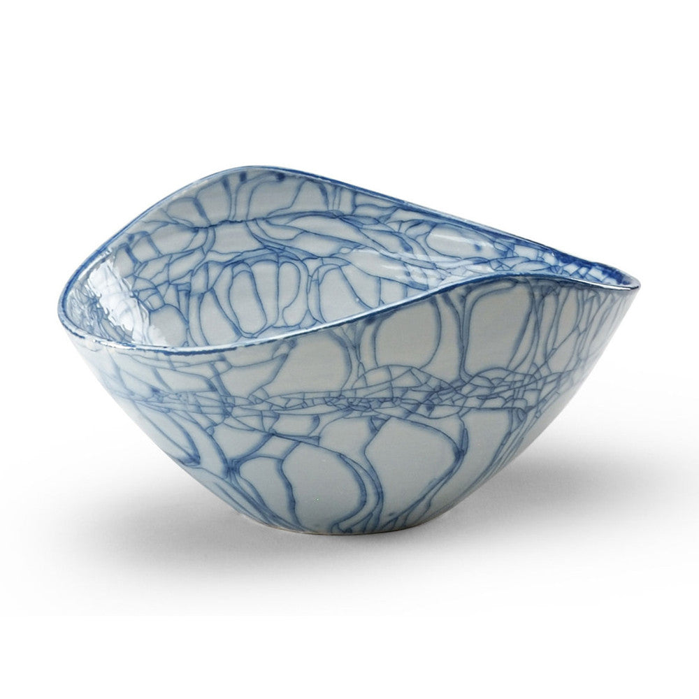 Nicola Porcelain Bowl QR-21329.BLUE.0 by CuratedKravet CuratedKravet A large porcelain bowl uniquely glazed along the crackled edges of the bowls' surface. Due to the handmade nature of this bowl, variation is to be expected. Italy DUST LIGHTLY WITH A SOFT, DRY CLOTH. </p><p>Dimensions: Length 17.5, Height 9.5, Width 13.5 Porcelain - 100% - Fabric Carolina -