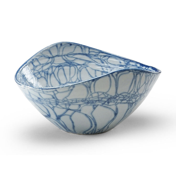 Nicola Porcelain Bowl QR-21329.BLUE.0 by CuratedKravet CuratedKravet A large porcelain bowl uniquely glazed along the crackled edges of the bowls' surface. Due to the handmade nature of this bowl, variation is to be expected. Italy DUST LIGHTLY WITH A SOFT, DRY CLOTH. </p><p>Dimensions: Length 17.5, Height 9.5, Width 13.5 Porcelain - 100% - Fabric Carolina -