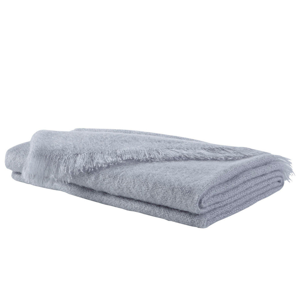 Cebile Sheer Mohair Throw QR-10663.PALE GRAY.0 by CuratedKravet CuratedKravet Sheer, refined mohair blend throw. Mohair and wool with a touch of nylon. Made in South Africa. South Africa Dry clean only. Do not iron. </p><p>Dimensions: Length 71, Height , Width 51 Mohair - 64%, Wool - 30%, Nylon - 6% - Fabric Carolina -