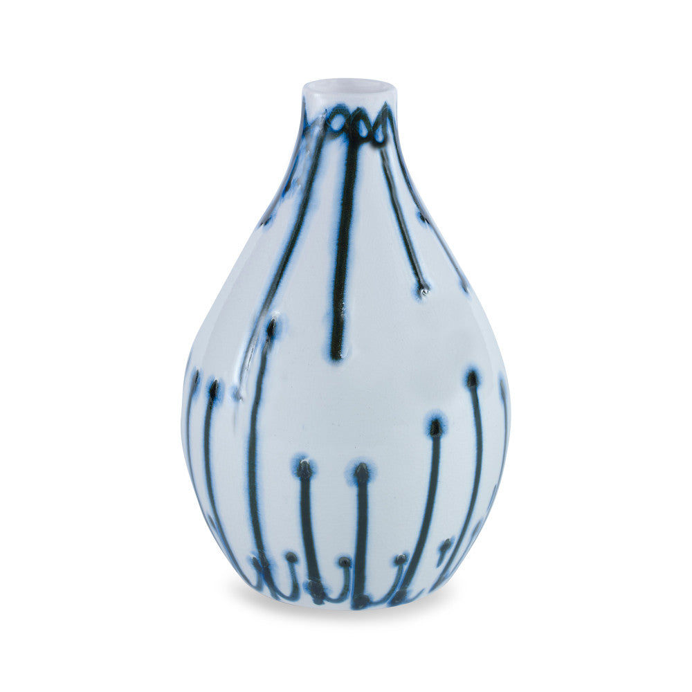 Mira Vase, Small QR-16962.BLUE.0 by CuratedKravet CuratedKravet A handpainted, earthenware vase with a reactive blue glaze. Due to the handmade nature of this product, variation is to be expected from piece to piece. This vase is not watertight. Portugal HANDWASH ONLY. </p><p>Dimensions: Length 6, Height 8.75, Width 6 Ceramic - 100% - Fabric Carolina -