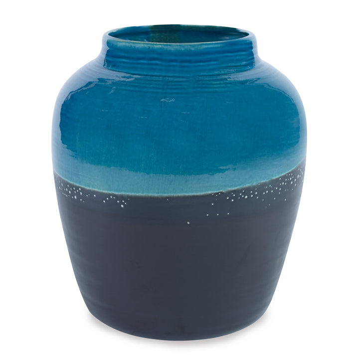 Aries Vase, Medium QR-16965.BLKBLUE.0 by CuratedKravet CuratedKravet A handpainted, earthenware vase with a reactive blue and black glaze. Due to the handmade nature of this product, variation is to be expected from piece to piece. This vase is not watertight. Portugal HANDWASH ONLY. </p><p>Dimensions: Length 9, Height 10.25, Width 9 Ceramic - 100% - Fabric Carolina -