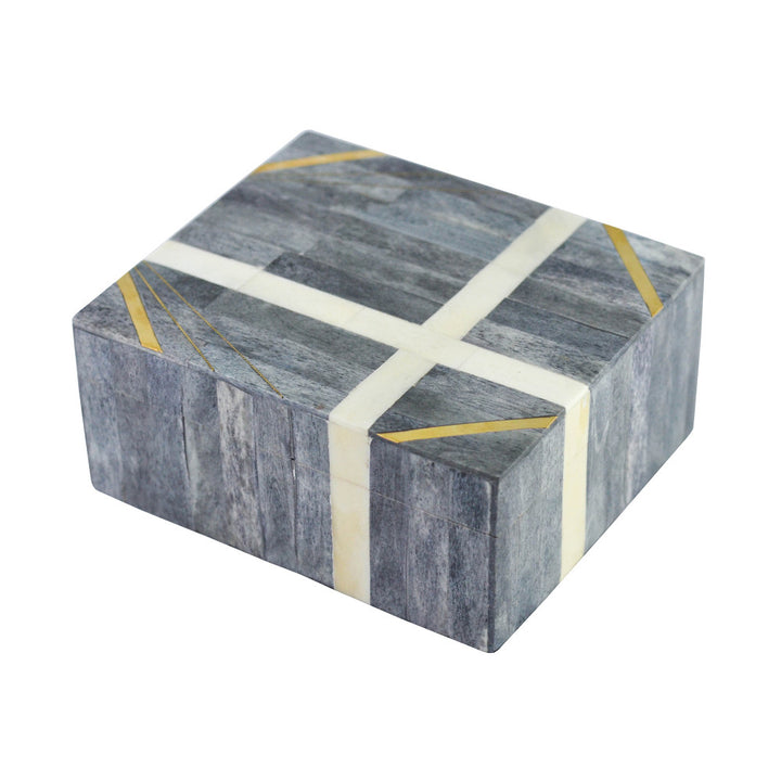 Tempe Box QR-18261.GRAY.0 by CuratedKravet CuratedKravet A gray bone lidded box with two white criss-crossing stripe details. India DUST LIGHTLY WITH A SOFT, DRY CLOTH. </p><p>Dimensions: Length 7, Height 3, Width 6 Bone - 50%, Mdf - 50% - Fabric Carolina -