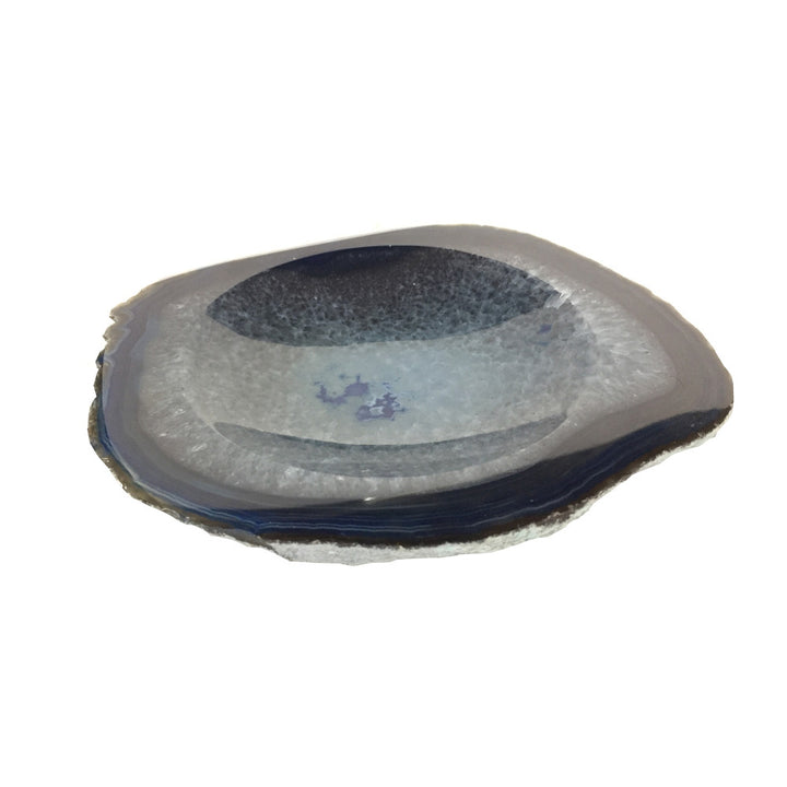 Ana Agate Trinket Dish, Blue QR-18385.BLUE.0 by CuratedKravet CuratedKravet A natural blue agate dish. Due to the natural material, size, shape and color will vary. Brazil DUST LIGHTLY. </p><p>Dimensions: Length 6, Height 0.75, Width 5.25 Stone - 100% - Fabric Carolina -