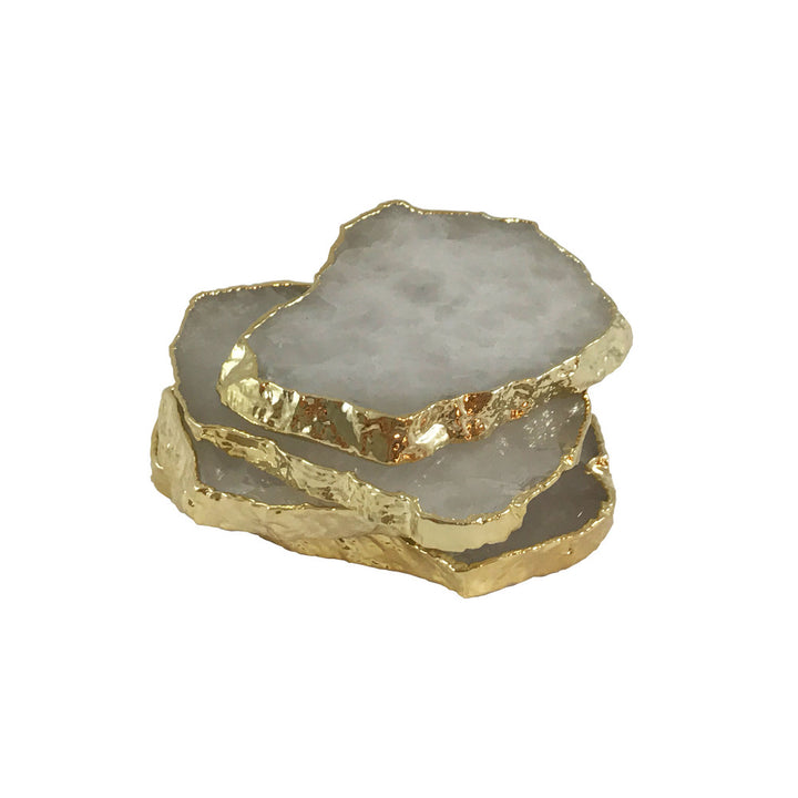 Luiz Crystal Coasters, Set Of 4 QR-18389.GLDCRYSTL.0 by CuratedKravet CuratedKravet A set of four natural white crystal coasters, detailed with gold electroplated edges. Due to the natural material, size, shape and color will vary. Brazil DUST LIGHTLY. </p><p>Dimensions: Length 4.25, Height 1.75, Width 3.5 Crystal Stone - 95%, Gold - 5% - Fabric Carolina -