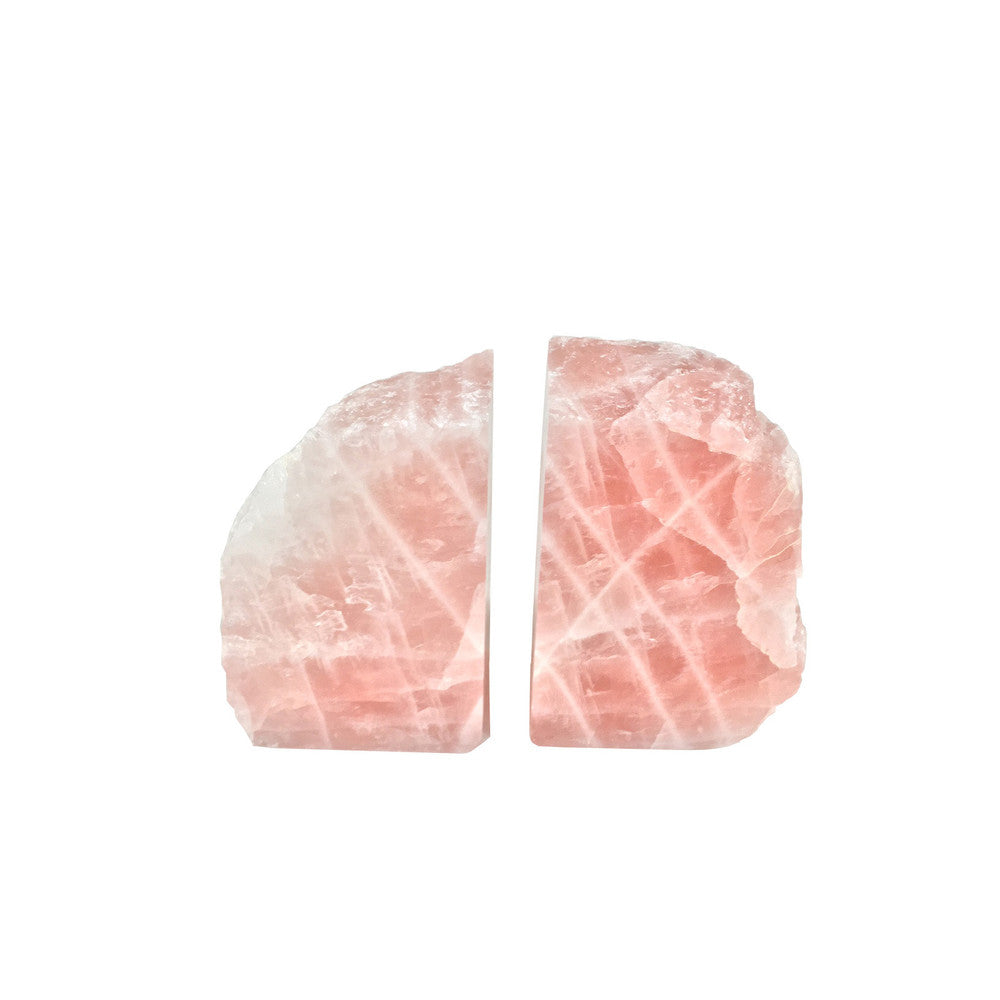 Francisca Rose Quartz Bookends QR-18400.ROSE.0 by CuratedKravet CuratedKravet A pair of natural rose quartz bookends. Due to the natural material, size, shape and color will vary. The bookends range in sizes from: 4.75"-6.75"L x 1.5"-2.75"W x 4"-6"H. Brazil DUST LIGHTLY. </p><p>Dimensions: Length , Height , Width Quartz - 100% - Fabric Carolina -