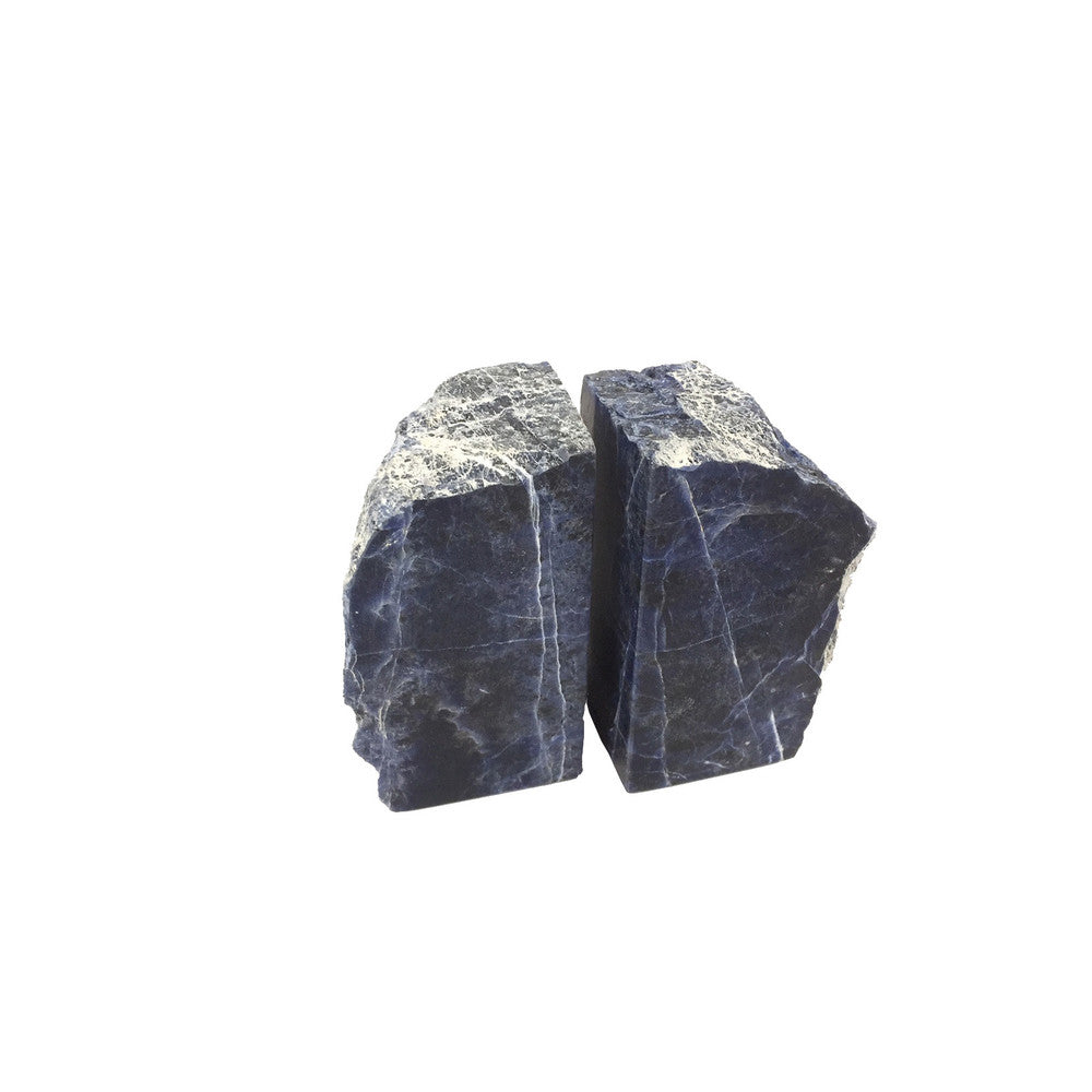Pedro Sodalite Bookends QR-18407.BLUE.0 by CuratedKravet CuratedKravet A pair of natural sodalite bookends. Due to the natural material, size, shape and color will vary. The bookends range in sizes from: 4.75"-6.75"L x 1.5"-2.75"W x 4"-6"H. Brazil DUST LIGHTLY. </p><p>Dimensions: Length , Height , Width Stone - 100% - Fabric Carolina -