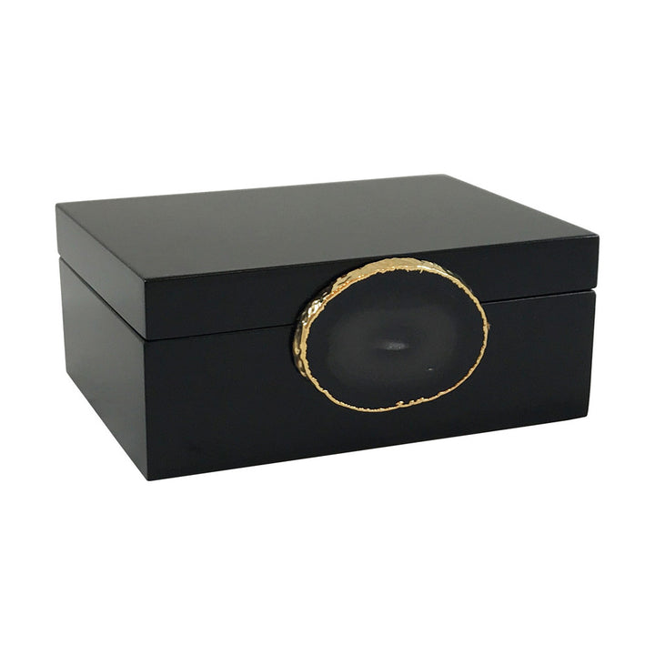 Guilherme Small Agate Box, Black/Natural QR-18411.NATBLKGLD.0 by CuratedKravet CuratedKravet A small decorative black wooden box featuring a gold plated, natural agate slice. Due to the natural material of the agate slice, size, shape and color will vary. Brazil DUST LIGHTLY. </p><p>Dimensions: Length 6, Height 2.5, Width 4.25 Mdf - 85%, Stone - 10%, Gold - 5% - Fabric Carolina -