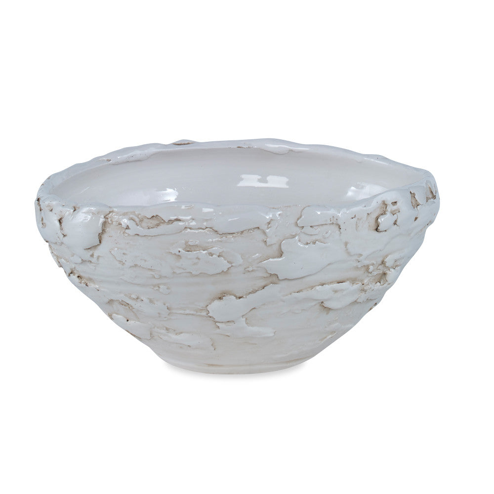 Matera Bowl QR-20532.CREAM.0 by CuratedKravet CuratedKravet A organically textured ceramic bowl finished in a creamy natural glaze. Due to the handmade nature of this bowl, variation is to be expected. Italy DUST LIGHTLY WITH A SOFT, DRY CLOTH. </p><p>Dimensions: Length 13.75, Height 6.25, Width 11.75 Ceramic - 100% - Fabric Carolina -