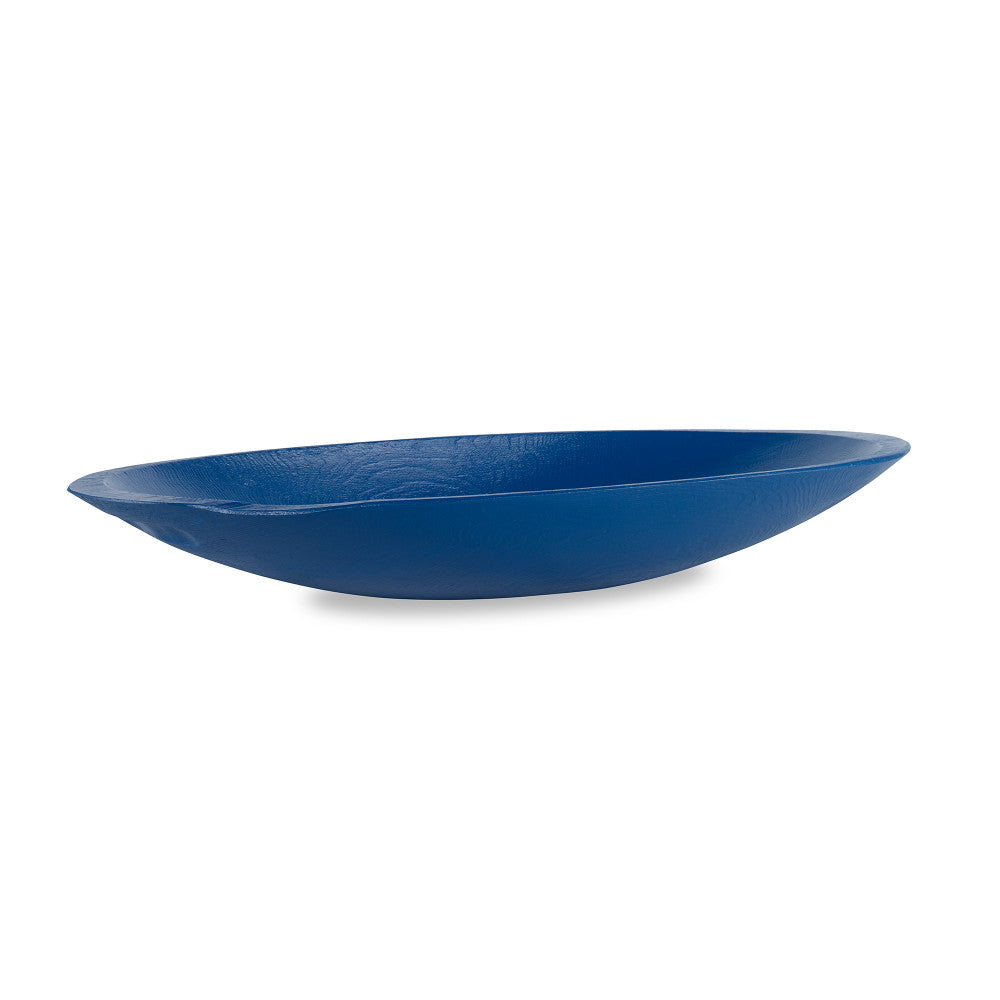 Levain Dough Bowl, Blue QR-21065.BLUE.0 by CuratedKravet CuratedKravet An oversized resin bowl cast from an antique wooden dough bowl, finished in a bright pop of color. The imperfections and character from the antique dough bowl are preserved in the mold and therefore transferred as beautiful texture to the resin bowl. United States </p><p>Dimensions: Length 24.75, Height 4.5, Width 12.5 Poly Resin - 100% - Fabric Carolina -