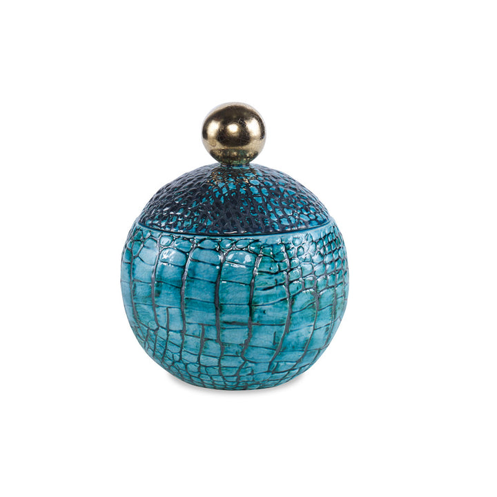 Rosa Box QR-21113.TURQGOLD.0 by CuratedKravet CuratedKravet A crocodile textured round lidded box in a bright turquoise color. Detailed with a gold lid accent. Due to the handmade nature of this box, variation is to be expected. Italy </p><p>Dimensions: Length 7, Height 8.5, Width 7 Ceramic - 100% - Fabric Carolina -