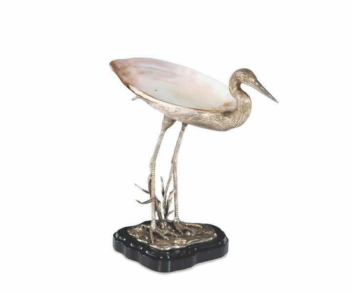 Reserve Shell Dish QR-21198.SLVRNTRL.0 by CuratedKravet CuratedKravet Silver plated heron sculpture with kabibi shell accent on black resin base. Philippines </p><p>Dimensions: Length 13.5, Height 13.25, Width 7.5 - Fabric Carolina -
