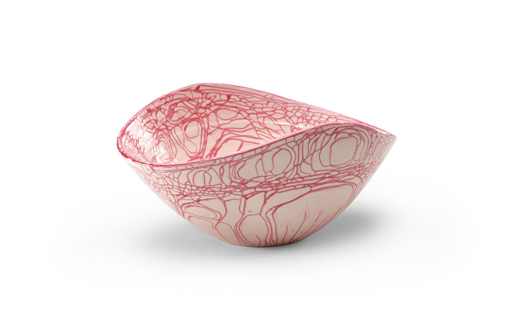 Nicola Porcelain Bowl QR-21329.RASPBERRY.0 by CuratedKravet CuratedKravet A large porcelain bowl uniquely glazed along the crackled edges of the bowls' surface. Due to the handmade nature of this bowl, variation is to be expected. Italy DUST LIGHTLY WITH A SOFT, DRY CLOTH. </p><p>Dimensions: Length 17.5, Height 9.5, Width 13.5 Porcelain - 100% - Fabric Carolina -