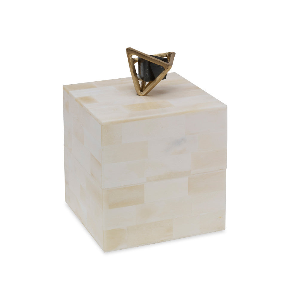 Rona Box QR-21395.NATBLKBRS.0 by CuratedKravet CuratedKravet A decorative bone lidded box detailed with a matte brass and black agate decorative accent on the lid. India DUST LIGHTLY WITH A SOFT, DRY CLOTH. </p><p>Dimensions: Length 5, Height 5, Width 5 Bone - 70%, Brass - 15%, Stone - 15% - Fabric Carolina -