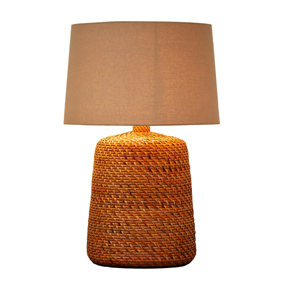 Vati Table Lamp QR-21724.NATURAL.0 by CuratedKravet CuratedKravet An oversized rattan table lamp topped with a coarse linen shade. Due to the natural material, variation is to be expected. Thailand </p><p>Dimensions: Length 21.5, Height 32, Width 21.5 Rattan - 70%, Linen - 30% - Fabric Carolina -