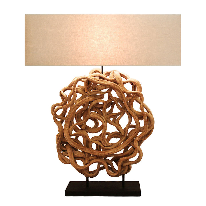 Byron Table Lamp QR-21725.NATURAL.0 by CuratedKravet CuratedKravet A table lamp made of naturally intertwined bleached wood vine mounted on a black base, topped with a course linen shade. Due to the natural material, no two lamps will be the same. Thailand </p><p>Dimensions: Length 31.5, Height 35.75, Width 7.75 Wood - 70%, Linen - 30% - Fabric Carolina -