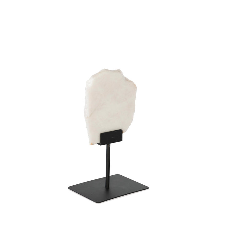 Angra Sculpture QR-21905.WHITE.0 by CuratedKravet CuratedKravet A slice of white quartz mounted on a black iron base. Due to the natural material, variation in size, shape and color is to be expected. Base only measures: 8"L x 6"W x 7.25"H. Overall height with the slab can range from 13.75"-17.75"H. Brazil DUST LIGHTLY WITH A SOFT, DRY CLOTH. </p><p>Dimensions: Length , Height , Width Iron - 50%, Stone - 50% - Fabric Carolina -