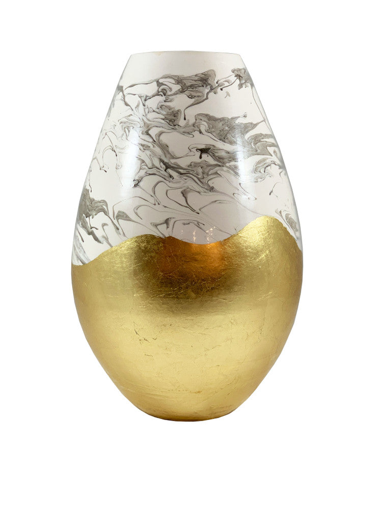 Umbria Vase QR-22010.SANDGOLD.0 by CuratedKravet CuratedKravet A porcelain vase featuring a swirled beige and white painted design, contrasted by a gold leafed bottom half. Due to the handmade nature of this vase, variation is to be expected. Italy DUST LIGHTLY WITH A SOFT, DRY CLOTH. </p><p>Dimensions: Length 9, Height 14, Width 9 Porcelain - 100% - Fabric Carolina -