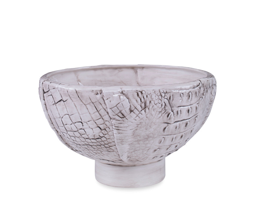 Ridley Bowl QR-22800.WHITEGRAY.0 by CuratedKravet CuratedKravet A handcrafted ceramic bowl with a pedestal base. Detailed with a crocodile skin texture and unique gray wash glaze. Italy DUST LIGHTLY WITH A SOFT, DRY CLOTH. </p><p>Dimensions: Length 13.5, Height 8.5, Width 13.5 Ceramic - 100% - Fabric Carolina -