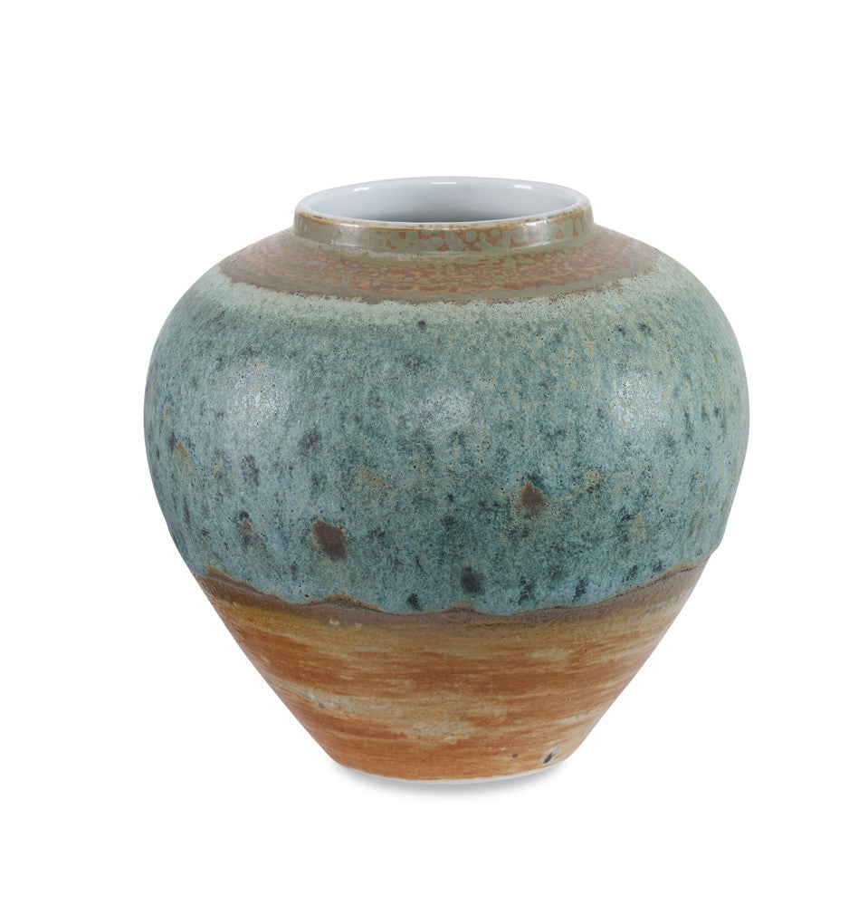 Clemmie Vase QR-22864.BLUNTRL.0 by CuratedKravet CuratedKravet A textured ceramic vase featuring a blend of blues and natural hued browns and tans. Due to the hand made nature of this vase, variation is to be expected. China DUST LIGHTLY WITH A SOFT, DRY CLOTH. </p><p>Dimensions: Length 8, Height 7.25, Width 8 Ceramic - 100% - Fabric Carolina -