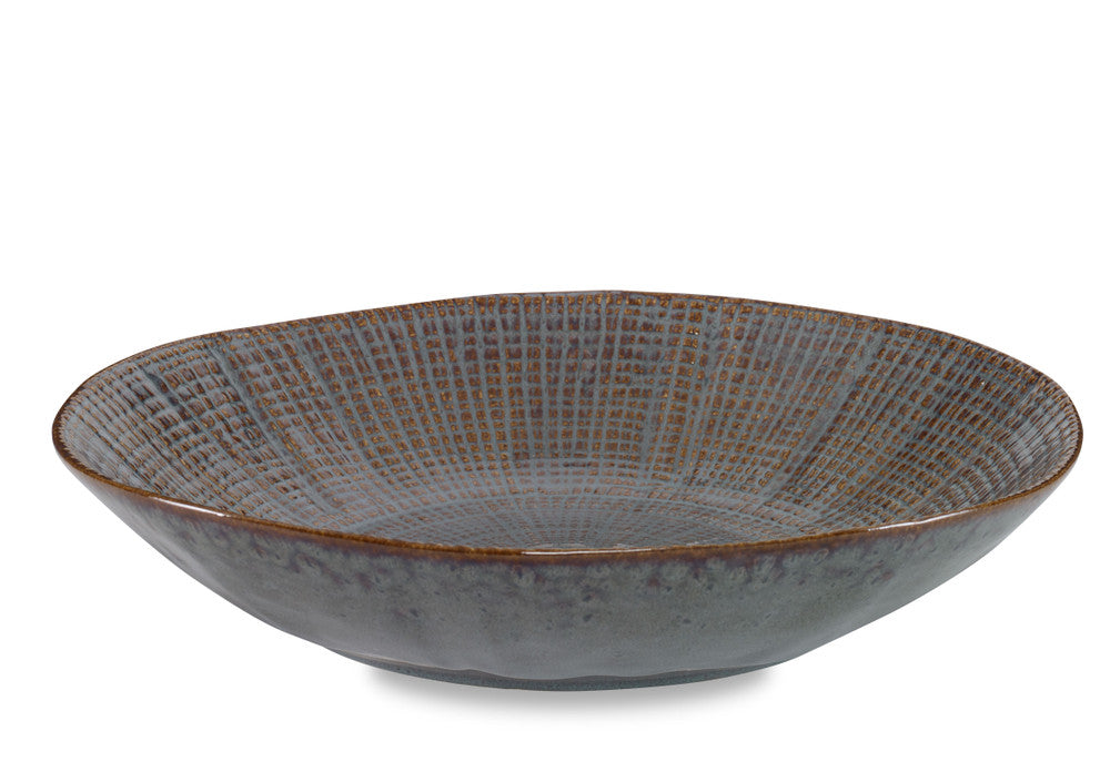 Alexa Bowl QR-22868.BLUBRWN.0 by CuratedKravet CuratedKravet A textured ceramic centerpiece bowl featuring a reactive blue and brown finish. Each bowl is handmade and unique. Portugal DUST LIGHTLY WITH A SOFT, DRY CLOTH. </p><p>Dimensions: Length 16.75, Height 3, Width 16.75 Ceramic - 100% - Fabric Carolina -