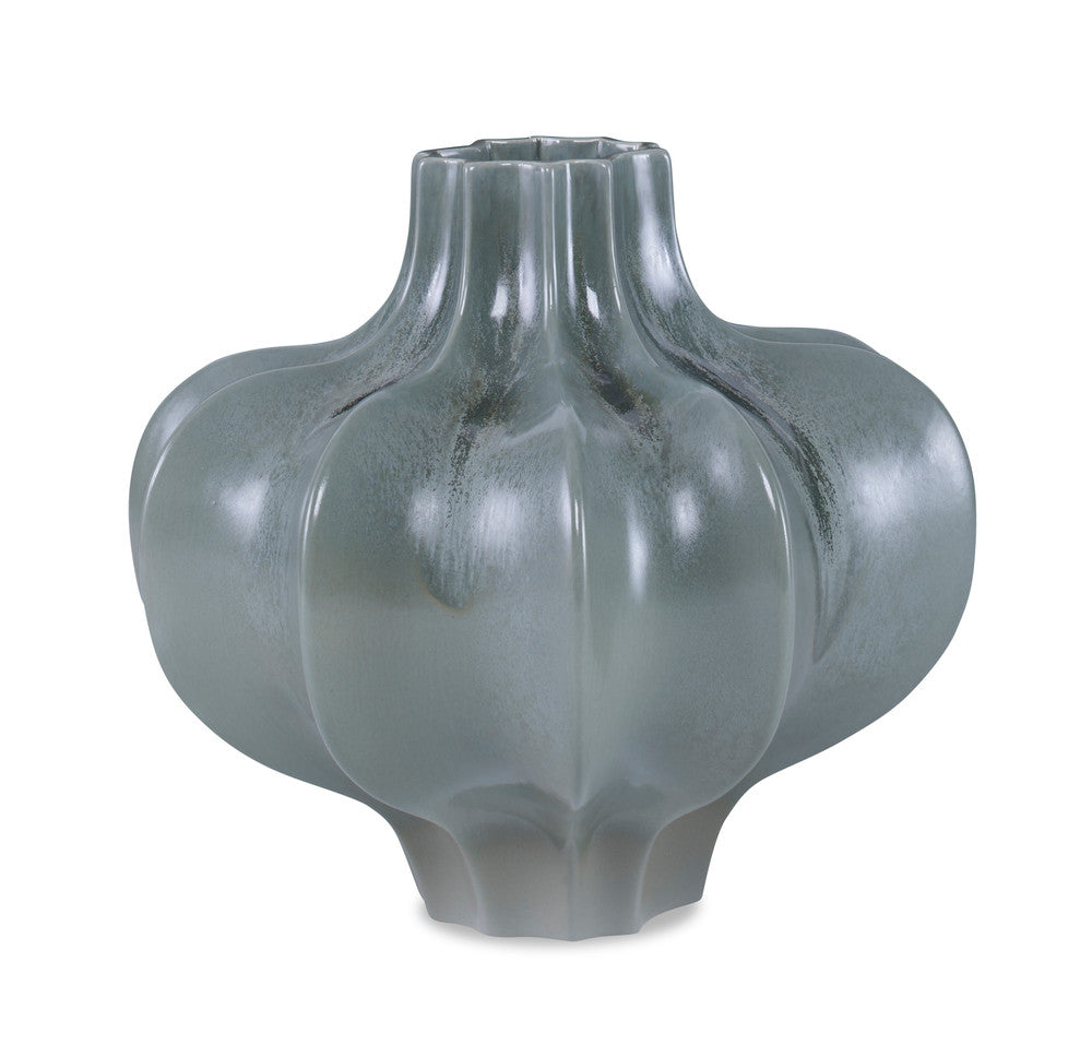 Coutts Vase, Small QR-22945.DRKGRNRCT.0 by CuratedKravet CuratedKravet A low decorative gourd shaped vase finished in a reactive dark green glaze. Due to the handmade nature of this product, variation is to be expected. Portugal DUST LIGHTLY WITH A SOFT, DRY CLOTH. </p><p>Dimensions: Length 10.25, Height 9, Width 9.5 Ceramic - 100% - Fabric Carolina -