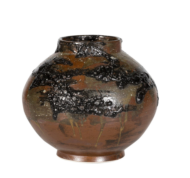 Vega Vase QR-23218.BRWNBLK.0 by CuratedKravet CuratedKravet A ceramic vase feautring a textural finish in varying brown and black hues. Due to the hand made nature of this vase, variation is to be expected. China DUST LIGHTLY WITH A SOFT, DRY CLOTH. </p><p>Dimensions: Length 11.5, Height 10, Width 11.5 Ceramic - 100% - Fabric Carolina -