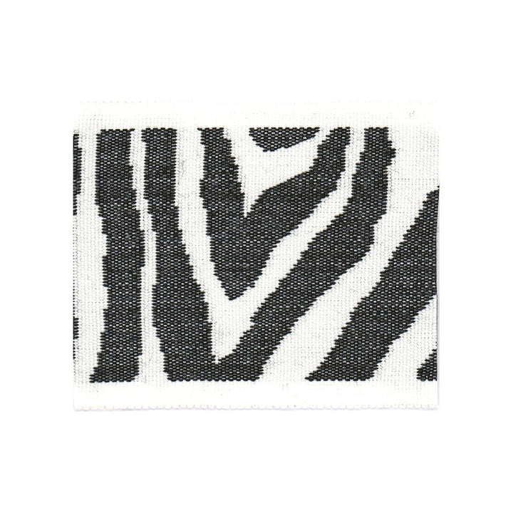 Safari Tape 1 Domino by Stout Trim Stout Trim Safari Tape 1 DominoTrim BEACH GROVE TRIM 100%SDA CHINA </p><p>Repeat: H: 8.000, V: 0.000 3.13 in - Fabric Carolina -