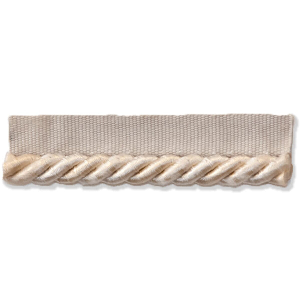 Snaps 6 Vanilla by Stout Trim Stout Trim Snaps 6 VanillaTrim ART OF DESIGN TRIM-2 CORDS 60%COT 40%SVI CHINA </p><p>Repeat: H: 0.000, V: 0.000 0.38 in - Fabric Carolina -