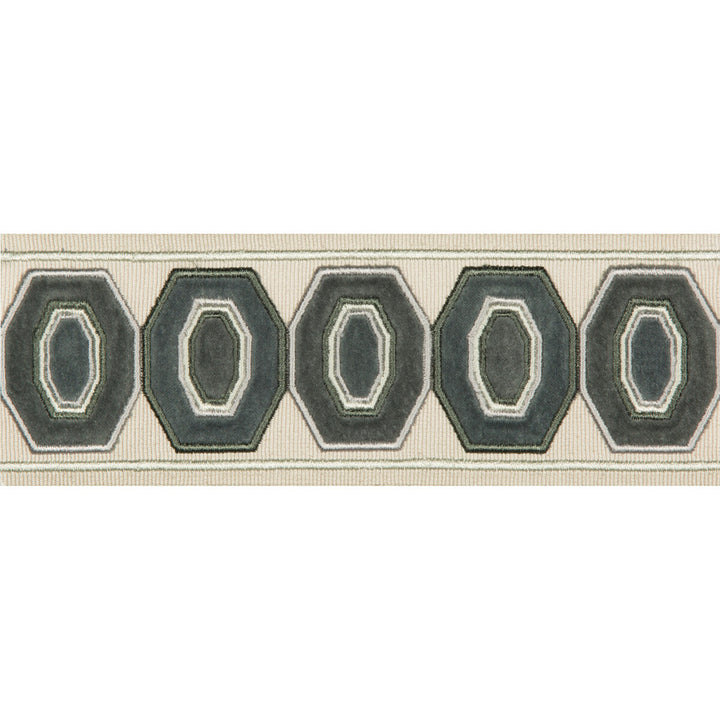 Geodex Steel Grey by Kravet Design Trim Kravet Design Trim Geodex Steel GreyTrim BRAIDS BANDS & BORDERS RAYON - 75%;COTTON - 25% India </p><p>Repeat: H: 3, V: 12.7 3 - Fabric Carolina -