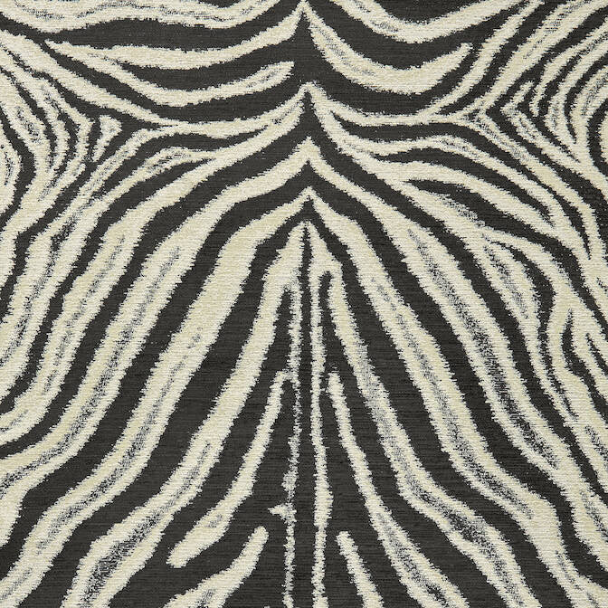 Zamira Black W80438 by Thibaut Fabric Thibaut Fabric Zamira Black W80438Fabric Woven Res. 10: Menagerie 54%Ray 24%Poly 22%Cot-acr back U.S.A. </p><p>Repeat: V: 40.25 54 - Fabric Carolina -