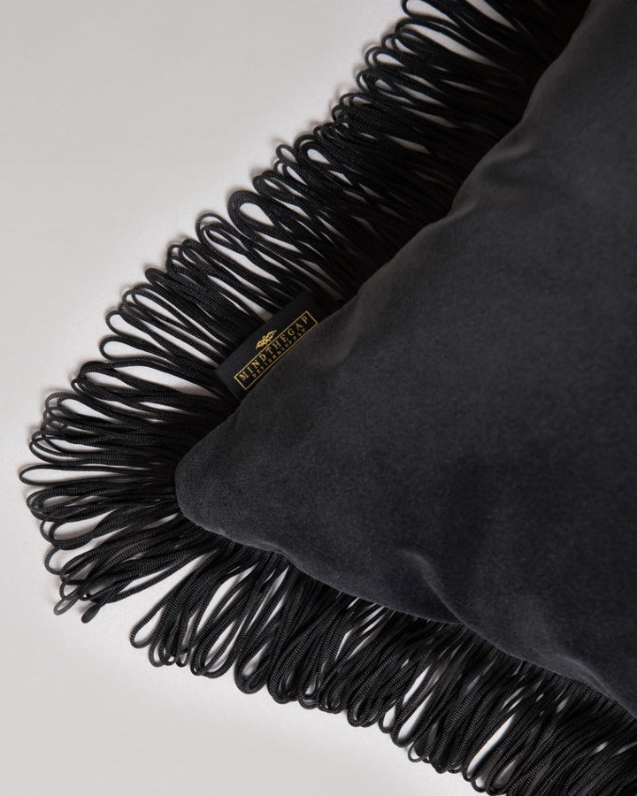 CHARCOAL Velvet Cushion (LC40234) by Mind The Gap | LC40234 | JAZZ LIVE | 50 x 50 cm | Black | Black fringes | Duck feather | Cotton velvet | Fabric Carolina | https://www.fabriccarolina.com/