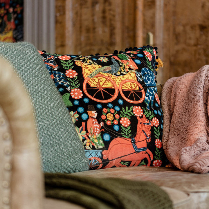 Fasnacht Anthracite Velvet Cushion by Mind the Gap Designer Pillow TYROL APRES-SKI HOME COLLECTION 100% Cotton velvet Made in Romania Pom-pom trim all around and tasseled corners 20 x 20 in - Swanky Fabrics -