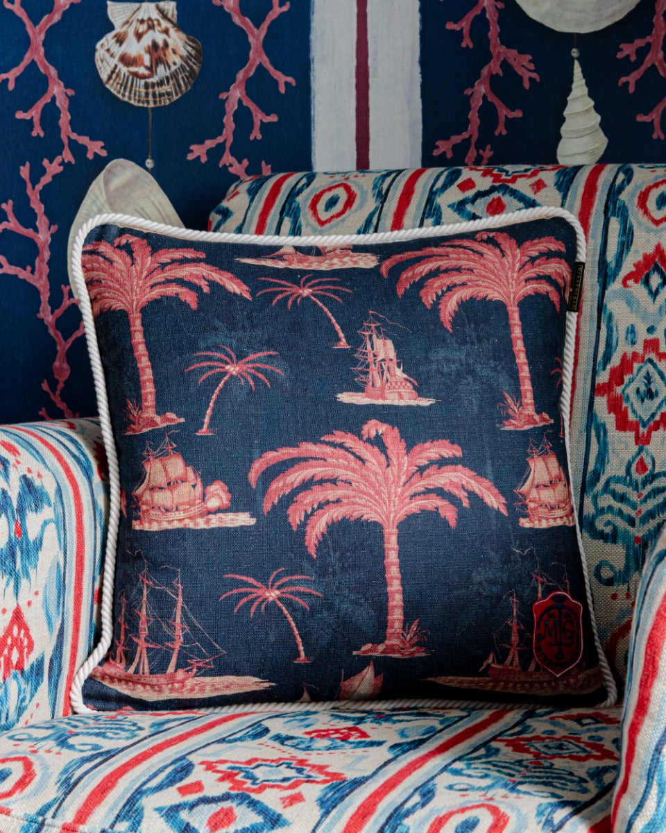 AEGEAN Indigo Cushion (LC40109) by Mind The Gap | LC40109 | SUNDANCE VILLA | 50 x 50 cm | Taupe, Red, Indigo | Off-white rope border | Duck feather | 82% Viscose and 18% Linen, printed and stonewashed | Fabric Carolina | https://www.fabriccarolina.com/