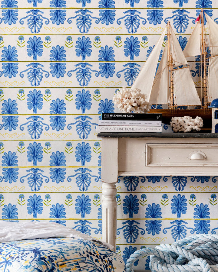 MYKONOS VILLA MOTIF White Sand Wallpaper (WP30043) by Mind The Gap | WP30043 | SUNDANCE VILLA | 1 roll x 20.5 x 393.7 in | 0.52m / 20.5in | 10m / 393.7in | 5.20mp | 56.5cm / 22.2in | Blue, White, Yellow | Satin Matte | Paste the wall | 1-roll in a box | Fabric Carolina | https://www.fabriccarolina.com/