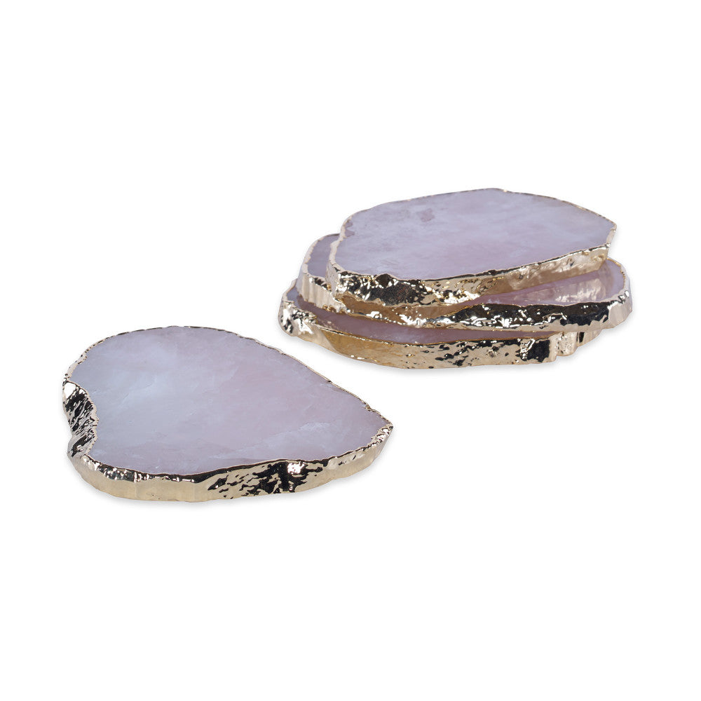 Aitana Rose Quartz Coasters, Set Of 4 QR-18388.GOLDROSE.0 by CuratedKravet CuratedKravet A set of four natural rose quartz coasters, detailed with gold electroplated edges. Due to the natural material, size, shape and color will vary. Brazil DUST LIGHTLY. </p><p>Dimensions: Length 4.25, Height 1.75, Width 3.5 Quartz - 95%, Gold - 5% - Fabric Carolina -