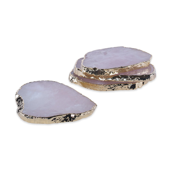 Aitana Rose Quartz Coasters, Set Of 4 QR-18388.GOLDROSE.0 by CuratedKravet CuratedKravet A set of four natural rose quartz coasters, detailed with gold electroplated edges. Due to the natural material, size, shape and color will vary. Brazil DUST LIGHTLY. </p><p>Dimensions: Length 4.25, Height 1.75, Width 3.5 Quartz - 95%, Gold - 5% - Fabric Carolina -