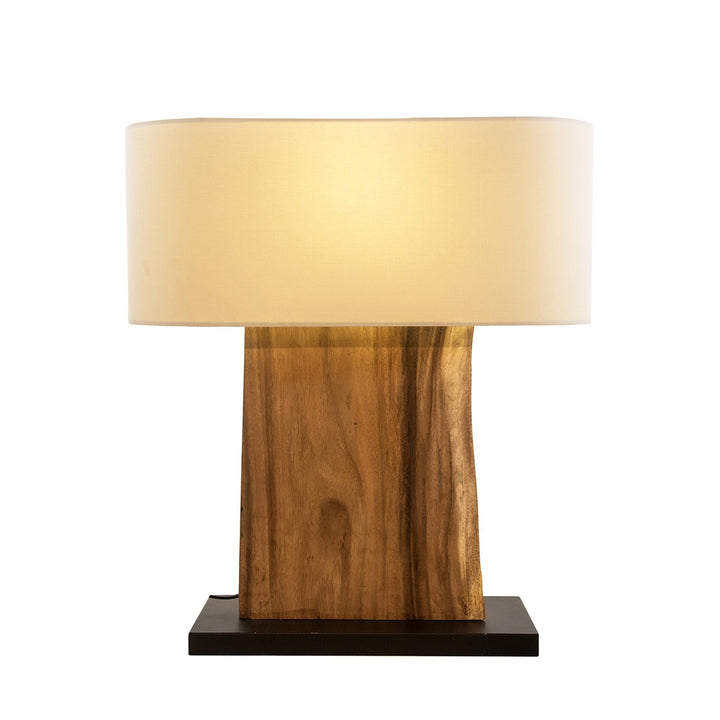 Guerra Table Lamp QR-18719.NATURAL.0 by CuratedKravet CuratedKravet A wood slice table lamp topped with a light cream linen shade. Please note: this table lamp is one sided as the cord is visible on the reverse side. Thailand DUST LIGHTLY WITH A SOFT, DRY CLOTH. </p><p>Dimensions: Length 22, Height 24.5, Width 8 Wood - 65%, Linen - 25%, Metal - 10% - Fabric Carolina -