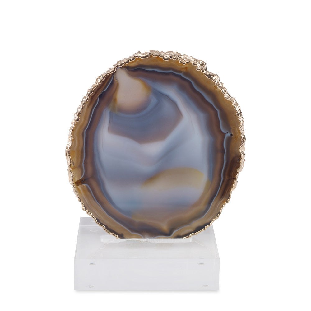 Jau Sculpture, Amber QR-18771.AMBERGOLD.0 by CuratedKravet CuratedKravet An amber agate slice with gold plated edges mounted on a clear acrylic base. Due to the natural material, variation in size, shape, and color is to be expected. Brazil DUST LIGHTLY WITH A SOFT, DRY CLOTH. FRAGILE PRODUCT, HANDLE WITH CARE. </p><p>Dimensions: Length 4.75, Height 5.5, Width 3.25 Stone - 50%, Acrylic - 40%, Gold - 10% - Fabric Carolina -