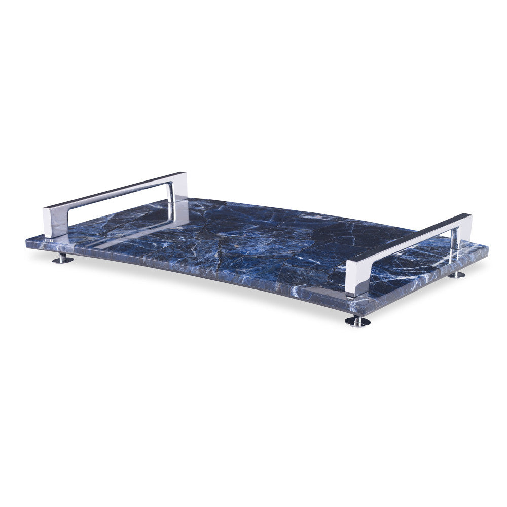 Rio Claro Tray, Small Blue QR-18772.BLUE.0 by CuratedKravet CuratedKravet A small decorative tray made of natural Sodalite stone, accented with silver metal handles and feet. Due to the natural material, variation is to be expected in color and pattern. Brazil FRAGILE, HANDLE WITH CARE. DUST WITH A SOFT CLOTH. </p><p>Dimensions: Length 13.75, Height 2, Width 8.25 Stone - 85%, Poly Resin - 10%, Metal - 5% - Fabric Carolina -