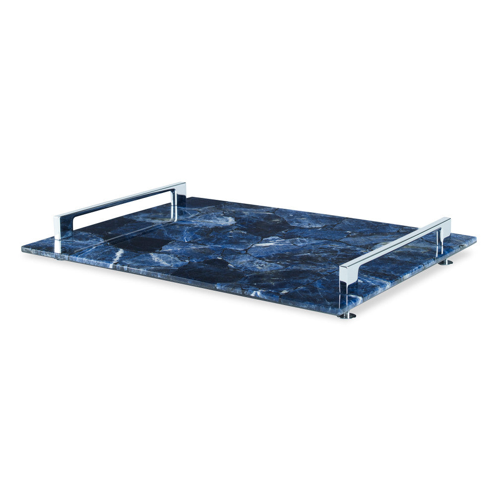 Rio Claro Tray, Large Blue QR-18773.BLUE.0 by CuratedKravet CuratedKravet A large decorative tray made of natural Sodalite stone, accented with silver metal handles and feet. Due to the natural material, variation is to be expected in color and pattern. Brazil FRAGILE, HANDLE WITH CARE. DUST WITH A SOFT CLOTH. </p><p>Dimensions: Length 16.5, Height 2, Width 12.5 Stone - 85%, Poly Resin - 10%, Metal - 5% - Fabric Carolina -