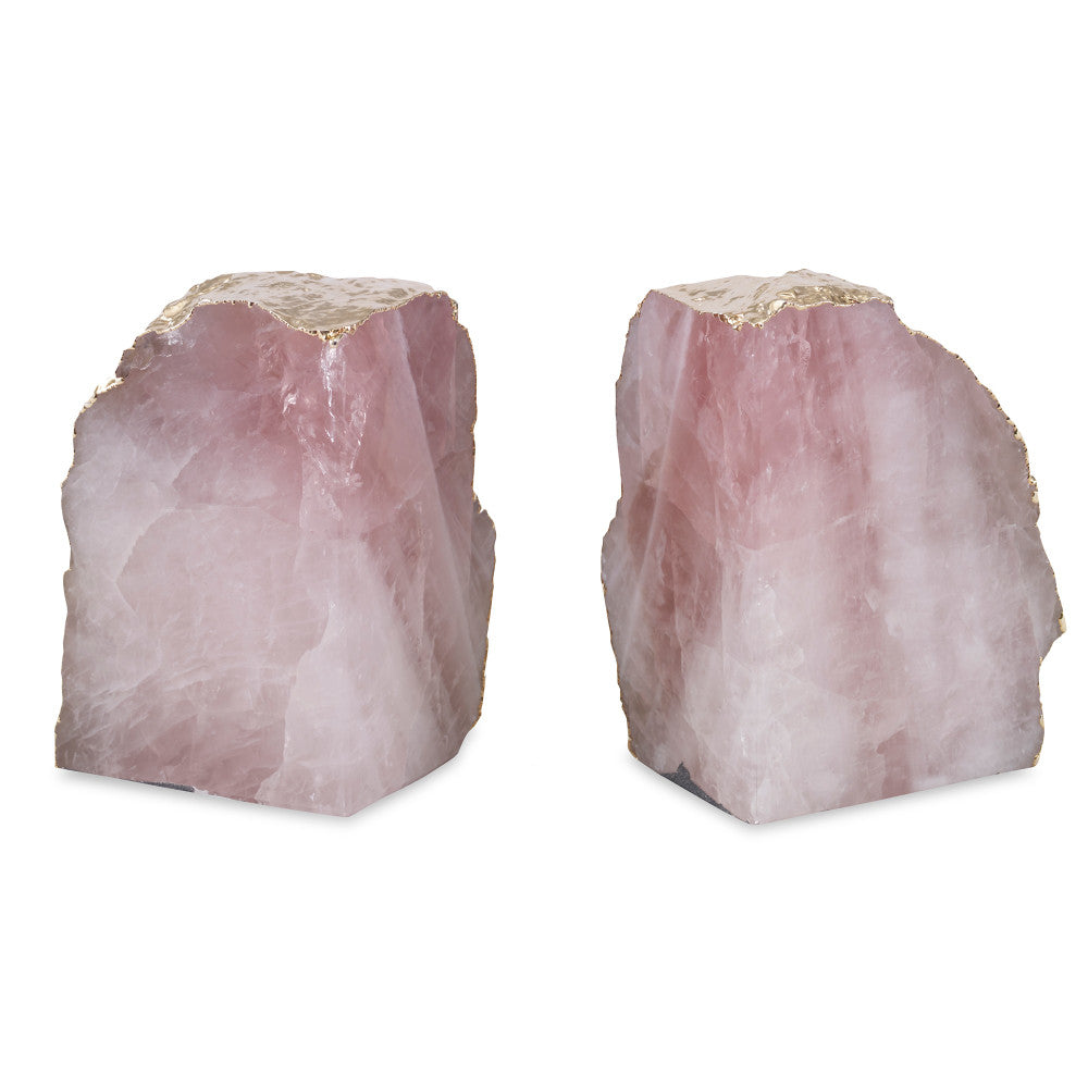 Jacarei Bookends QR-18786.PINKGLD.0 by CuratedKravet CuratedKravet A pair of natural rose quartz bookends, accented with gold plating on the exterior. Due to the natural material, variation in size, color, and shape is to be expected. Measures: 4.75"-6.75"L x 1.5"-2.75"W x 6.75"H Brazil FRAGILE, HANDLE WITH CARE. DUST LIGHTLY WITH A SOFT, DRY CLOTH. </p><p>Dimensions: Length , Height , Width Quartz - 95%, Gold - 5% - Fabric Carolina -