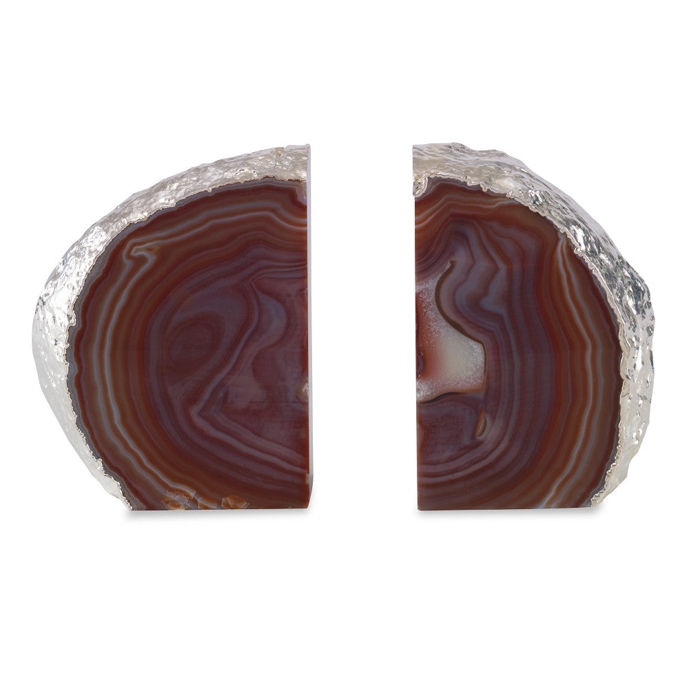 Franca Bookends, Red QR-18876.REDSLVR.0 by CuratedKravet CuratedKravet A pair of red agate bookends, detailed with silver electroplated edges. Due to the natural material, size, shape and color will vary. Measures: 4.75"-6.75"L x 1.5"-2.75"W x 6.75"H Brazil DUST LIGHTLY. </p><p>Dimensions: Length , Height , Width Stone - 90%, Silver Leaf - 10% - Fabric Carolina -