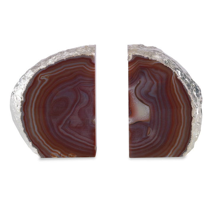 Franca Bookends, Red QR-18876.REDSLVR.0 by CuratedKravet CuratedKravet A pair of red agate bookends, detailed with silver electroplated edges. Due to the natural material, size, shape and color will vary. Measures: 4.75"-6.75"L x 1.5"-2.75"W x 6.75"H Brazil DUST LIGHTLY. </p><p>Dimensions: Length , Height , Width Stone - 90%, Silver Leaf - 10% - Fabric Carolina -