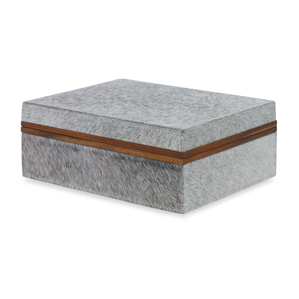 Hobart Box, Large QR-18885.NATGRAY.0 by CuratedKravet CuratedKravet A handmade box made with hair on hide and detailed with wood trim accents. India DUST LIGHTLY. </p><p>Dimensions: Length 9, Height 3.5, Width 7 Cow Hide - 50%, Mdf - 50% - Fabric Carolina -
