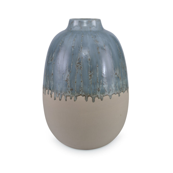 Meda Vase, Medium QR-19127.GRNREACT.0 by CuratedKravet CuratedKravet An earthenware vase featuring a reactive green glaze. Due to the nature of the glaze, each vase is to be considered unique. Portugal DUST LIGHTLY. </p><p>Dimensions: Length 8, Height 11.75, Width 8 Ceramic - 100% - Fabric Carolina -