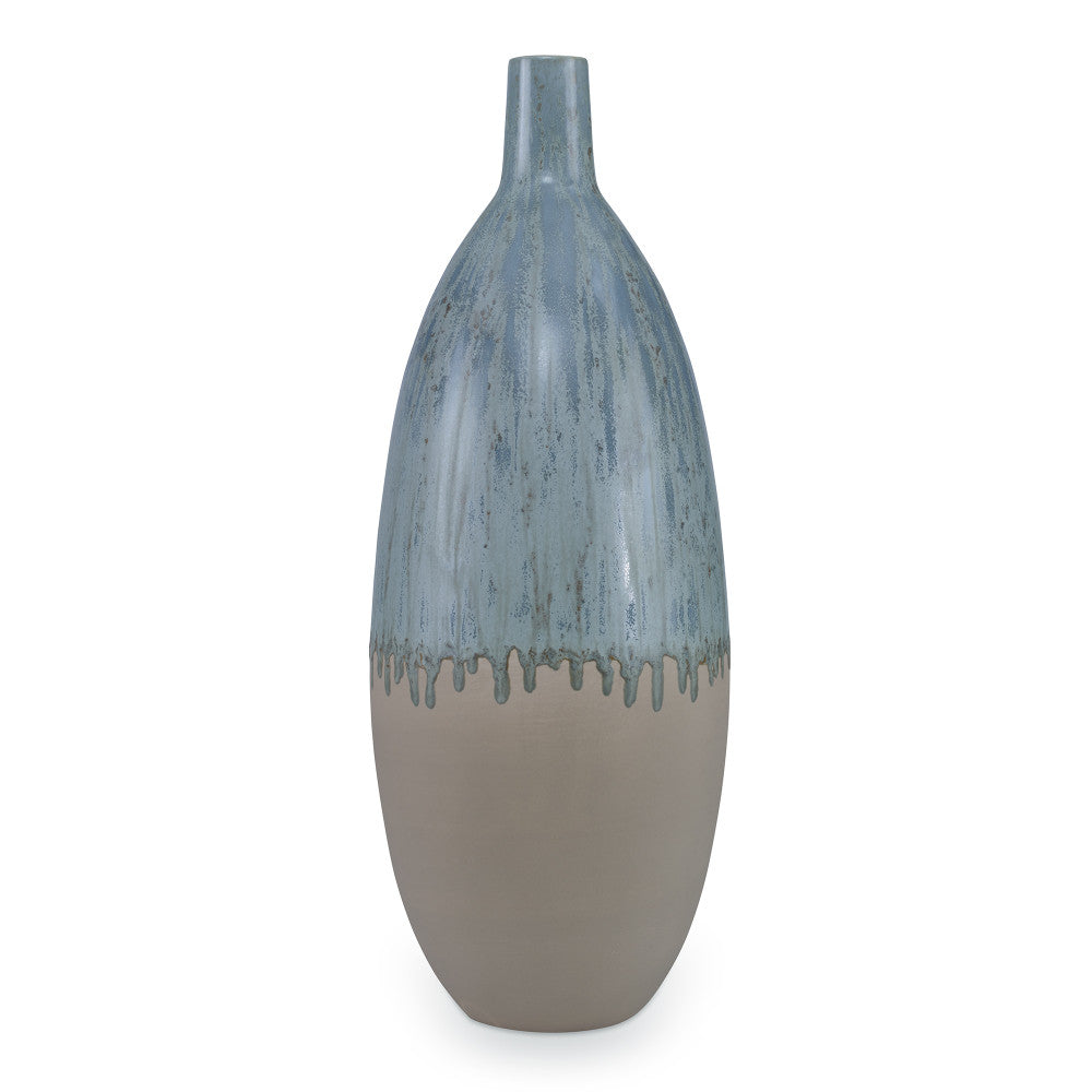 Meda Vase, Large QR-19128.GRNREACT.0 by CuratedKravet CuratedKravet A tall earthenware vase featuring a reactive green glaze. Due to the nature of the glaze, each vase is to be considered unique. Portugal DUST LIGHTLY. </p><p>Dimensions: Length 8.25, Height 21.25, Width 8.25 Ceramic - 100% - Fabric Carolina -